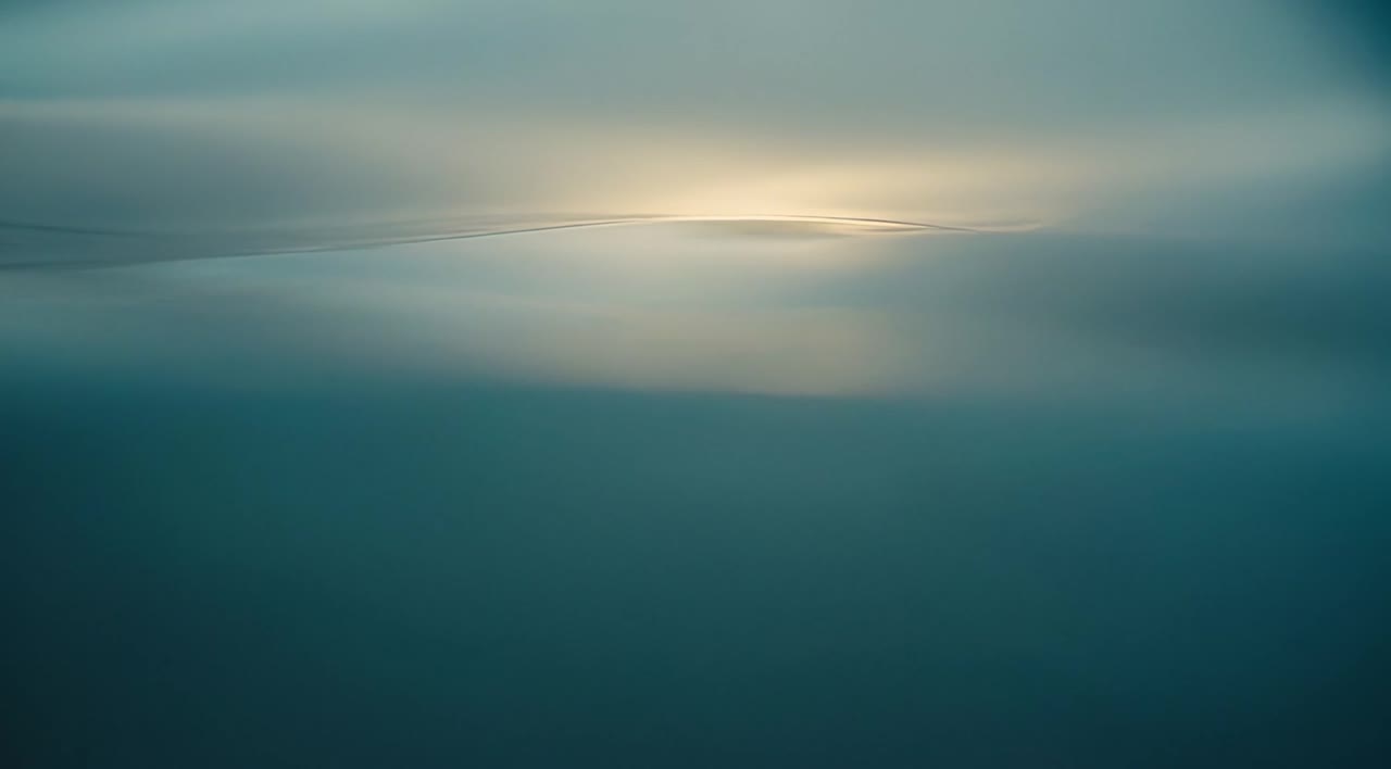 A blurry scene coming into focus as fog clears — confusion giving way to a clean, readable line.